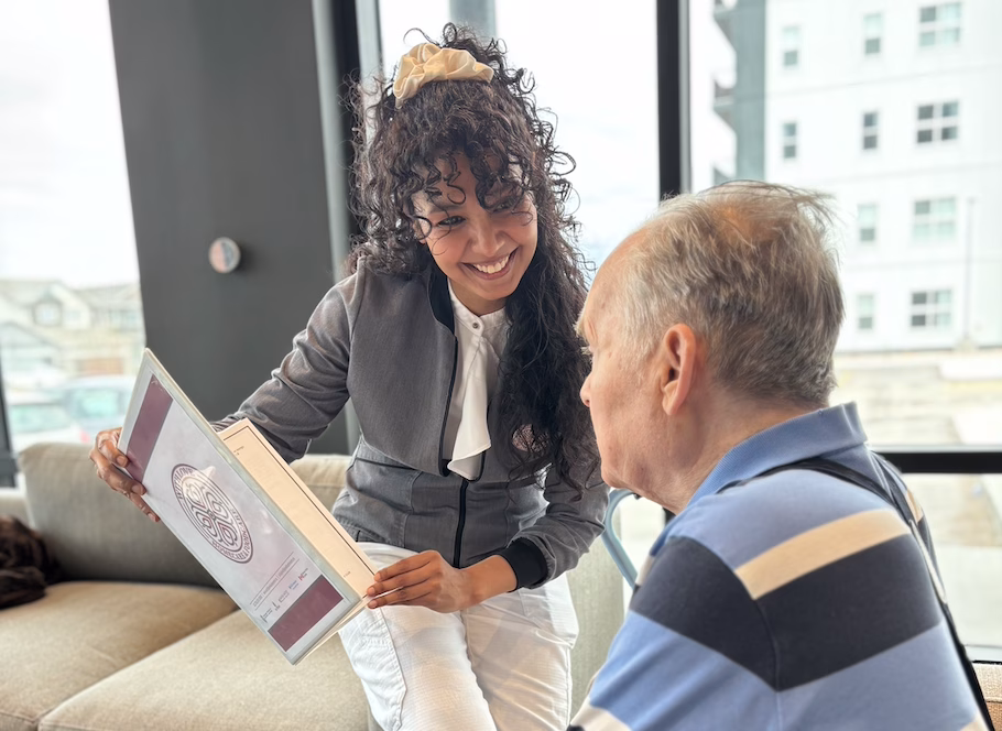 Natalie Sidhu, With Love Group Founder with a home care client